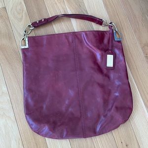 Deep red leather handbag